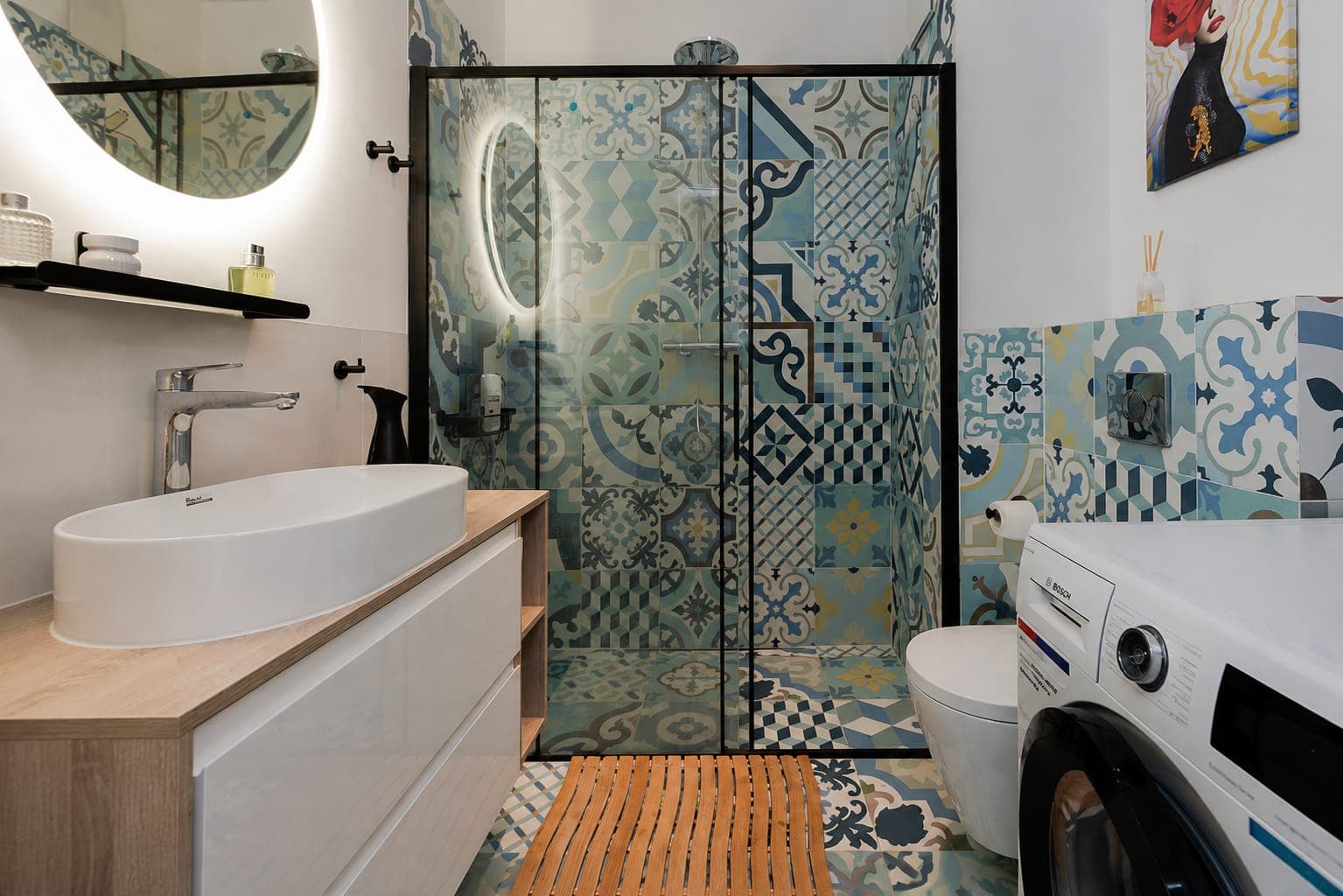 Bathroom with a walk-in shower and patterned tiles, apartment on Sierakowskiego in Praga-Północ, Warsaw